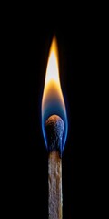 Match With Flame. Ignited Wooden Matchstick with Blue Fire on Black Background