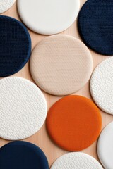Obraz premium Modern abstract composition with textured round pads in various colors and patterns creating an intriguing visual effect.