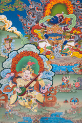 Obraz premium Buddhist mural on a wall featuring many different deities and buddhas, Sikkim, India