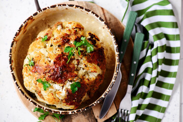 Whole baked cauliflower with minced meat and sauce..selective focus