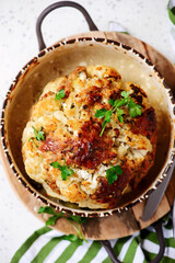 Whole baked cauliflower with minced meat and sauce..selective focus