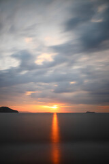 sunset on the beach. Seaside town of Turgutreis and spectacular sunsets. Selective Focus. Long Exposure shoot. tranquility scene.