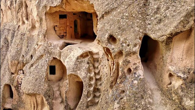 Ancient troglodytic cave dwellings and the rock castle of Uchisar, Cappadocia, Anatolia, T&uuml;rkiye