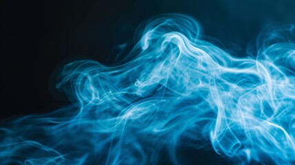 A photograph capturing blue smoke against a black background