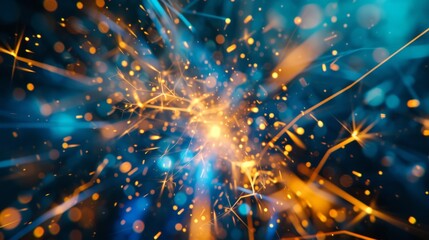 Vibrant blue and yellow sparks against a dark background