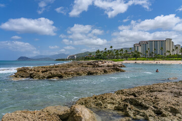 Ko Olina Beach Park, Leeward Coast of Oahu, Honolulu, Hawaii. Beachrock is a friable to well-cemented sedimentary rock.  