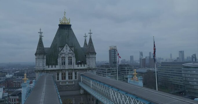 Top of London tower bridge - steady cam under overcast sky