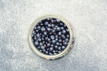 Fresh tasty aromatic blueberries on a beautiful background