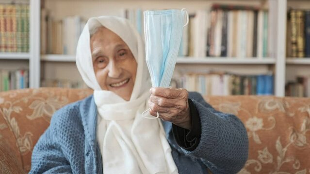 arabic old lady holding mask and looking to speak An ounce of prevention is better than a pound of cure this is rasool allah muhammad speech for all muslims