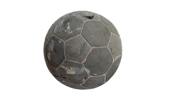 A worn black and red soccer ball on a white background