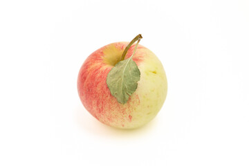 Red apple with green leaf isolated on a white background