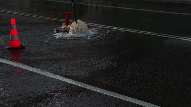 Street flooding occurs when water erupts from manholes in rain, exposing infrastructure and rainwater management issues