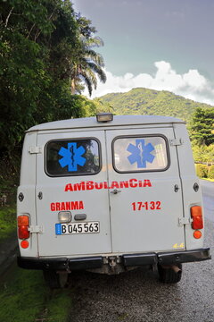 Rear view, UAZ-452A Soviet-designed Ambulance from 1965 in its 2000s version, parked on the roadside down from Santo Domingo village. Granma-Cuba-419