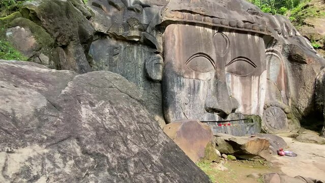 Unakoti a hindu archaeological site of bas relief structures from the ninth century. A must visit tourist destination in Tripura state of India.