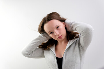 Naklejka premium Making a heart with your hands. Luxurious long hair. Back view. 