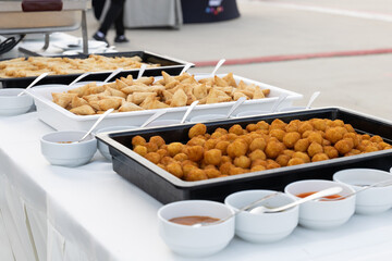 catering buffet with variety of snacks and appetizers at luxury event