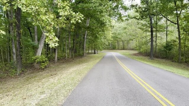 A hiking trail along the Natchez Trace Parkway on a sunny fall day