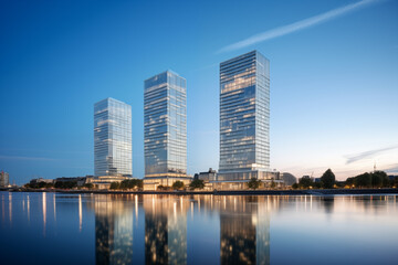 Obraz premium Imposing IJ Towers: An Epitome of Modern Architectural Prowess in Amsterdam's Skyline