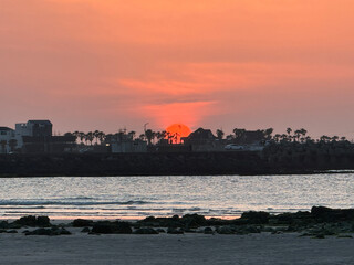 Fototapeta premium beautiful sunset at Hamdeok beach in Jeju island, South Korea