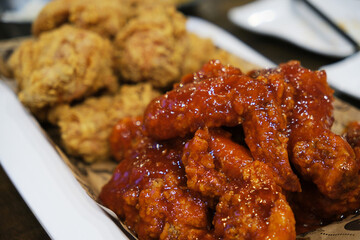spicy Korean fried chicken close up. Delicious Korean food