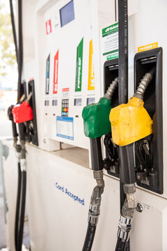 petrol station bowser with fuel hoses hanging up neatly