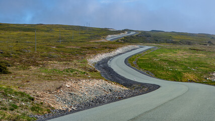 Brand new surface on the winding road through the Mistaken Point Ecological Reserve. Mistaken Point Ecological Reserve is a wilderness area and a UNESCO World Heritage Site.