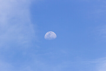 mid moon in the clouds