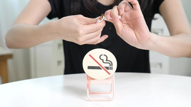 Woman who throws away cigarettes to No smoking
