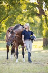 Equestrian Youth Teen Hunter Jumper riding attire with horse