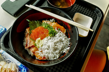 Shizuoka, Japan - November 12 2023 : A bowl of raw seafood with the specialty bieng a 