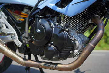 close up of a 4-Stroke underbone category motorbike engine