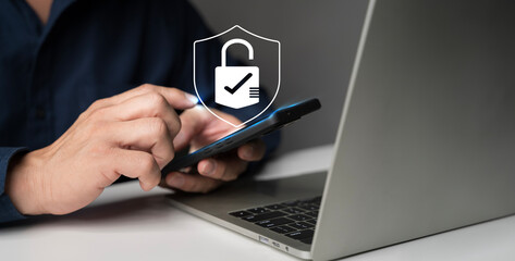 Cybersecurity and privacy concepts to protect data. Businessman use smartphone.
