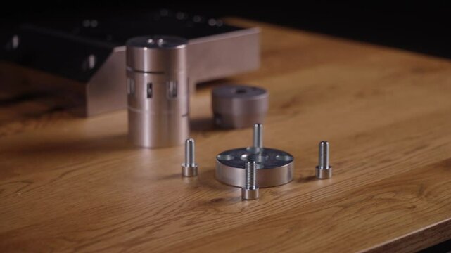CNC'd metal pieces on a table p3