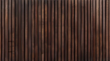 Fototapeta premium A mahogany dark wood vertical slat wall covering provides a rich and elegant backdrop. The individual slats, arranged vertically, exhibit a deep, warm tone with subtle variations in color and grain, 