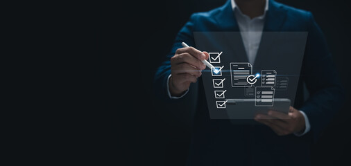 Concept of performance monitoring and tracking business performance, businessman using tablet...