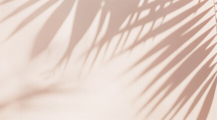 Palm leaves shadows on the beige wall. Summer vacation and luxury spa concept. Design for poster, wallpaper, banner, cards, flyers with copy space.