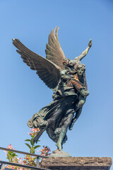 Close up of Bronze Angel Statue with sky background, Lucerne, Switzerland, 16 Aug 2022