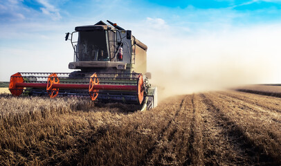 Agricultural yellow field machinery landscape background