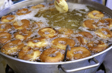 Frying donuts with oil