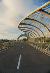 Residents are taking a morning walk around the iconic bridge at Marina Boom Beach.