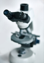 Microscope, technology and science in laboratory for innovation, analysis and research. Investigation, study and development in clinic for medicine, healthcare with pharmaceutical equipment or tools
