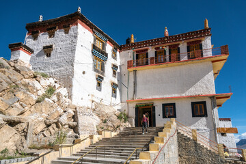 Picturesque Kee Monastery atop hill, grand mountains in distance, Spiti Valley, India