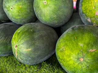 Watermelons on the counter in the market