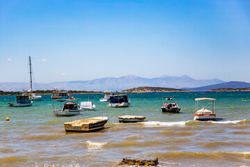 Fototapeta premium Fishing boats in the sea in sunny windy weather