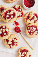 Strawberry jam cookies on parchment paper