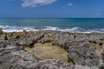  Ko Olina Beach Park, Leeward Coast of Oahu, Honolulu, Hawaii geology. Beachrock is a friable to well-cemented sedimentary rock. Salt weathering Tafoni
