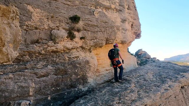 Man rock climbing aerial view of sportsman rapelling mountain in La Panocha, el Valle Murcia, Spain woman rapel down a mountain climbing a big rock