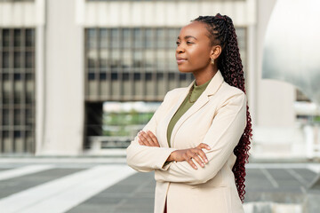 Confident Black Woman Entrepreneur Standing Outdoors in Business Attire