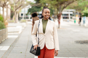 Confident Black Woman Entrepreneur Outdoors in Professional Business Attire