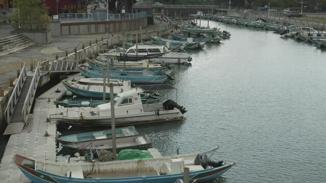 Guandu FIshing Port with Moored Fishing Boarts, Taipei, Taiwan, Tilt Up